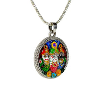 Close-up detail showcasing the traditional Mina work on the silver Jagannath locket.