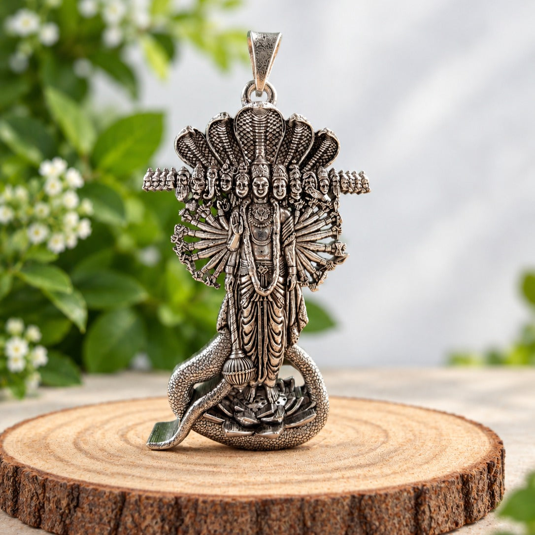 Ornate Silver Serpent Idol on Wood-crop.jpg Main image