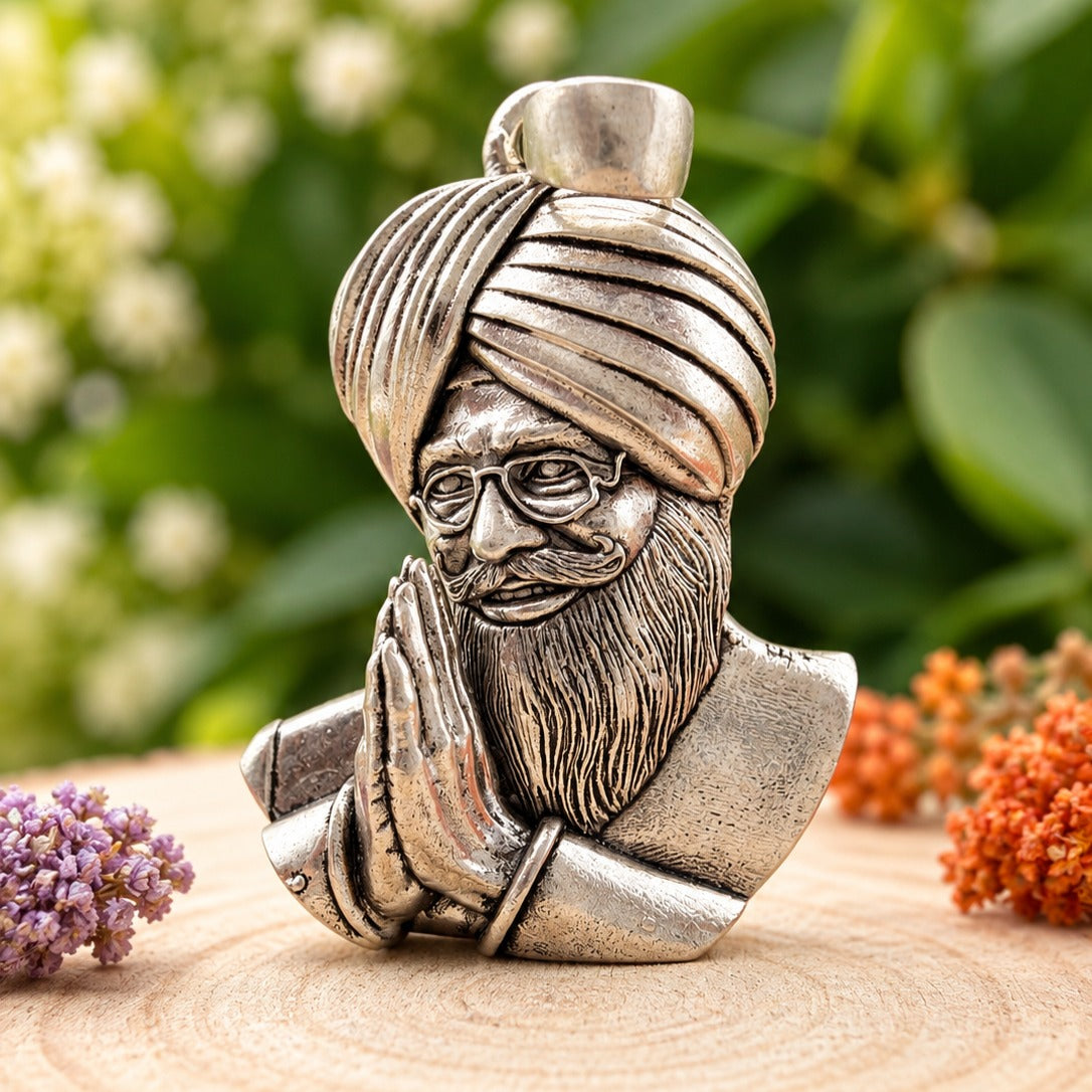 Silver Sikh Guru Bust on Wood Slice-crop.jpg Main image