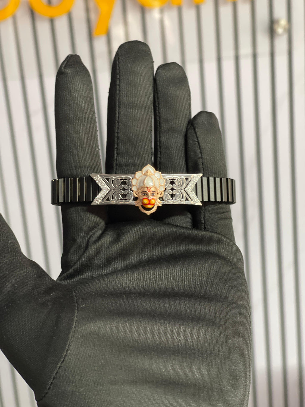 Front view of the 925 silver Hanumanji bracelet, showcasing the detailed Mina work and sparkling stones on the centerpiece.