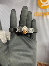 Close-up detail of the Hanumanji pendant on the 925 silver bracelet, highlighting the vibrant hand-done enamel colors.
