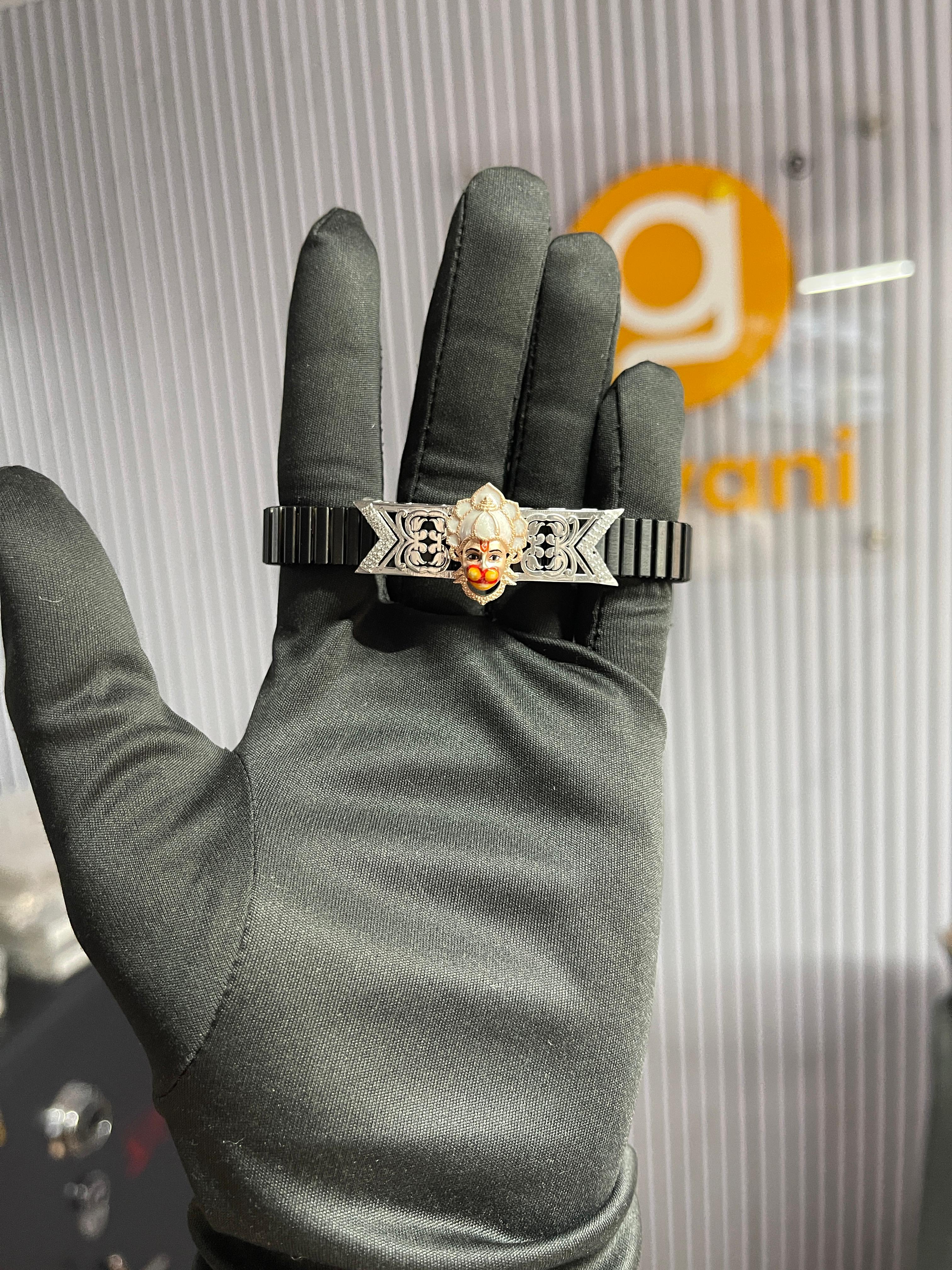 Angled view of the adjustable 925 sterling silver Hanumanji bracelet, showing its polished finish and devotional design.
