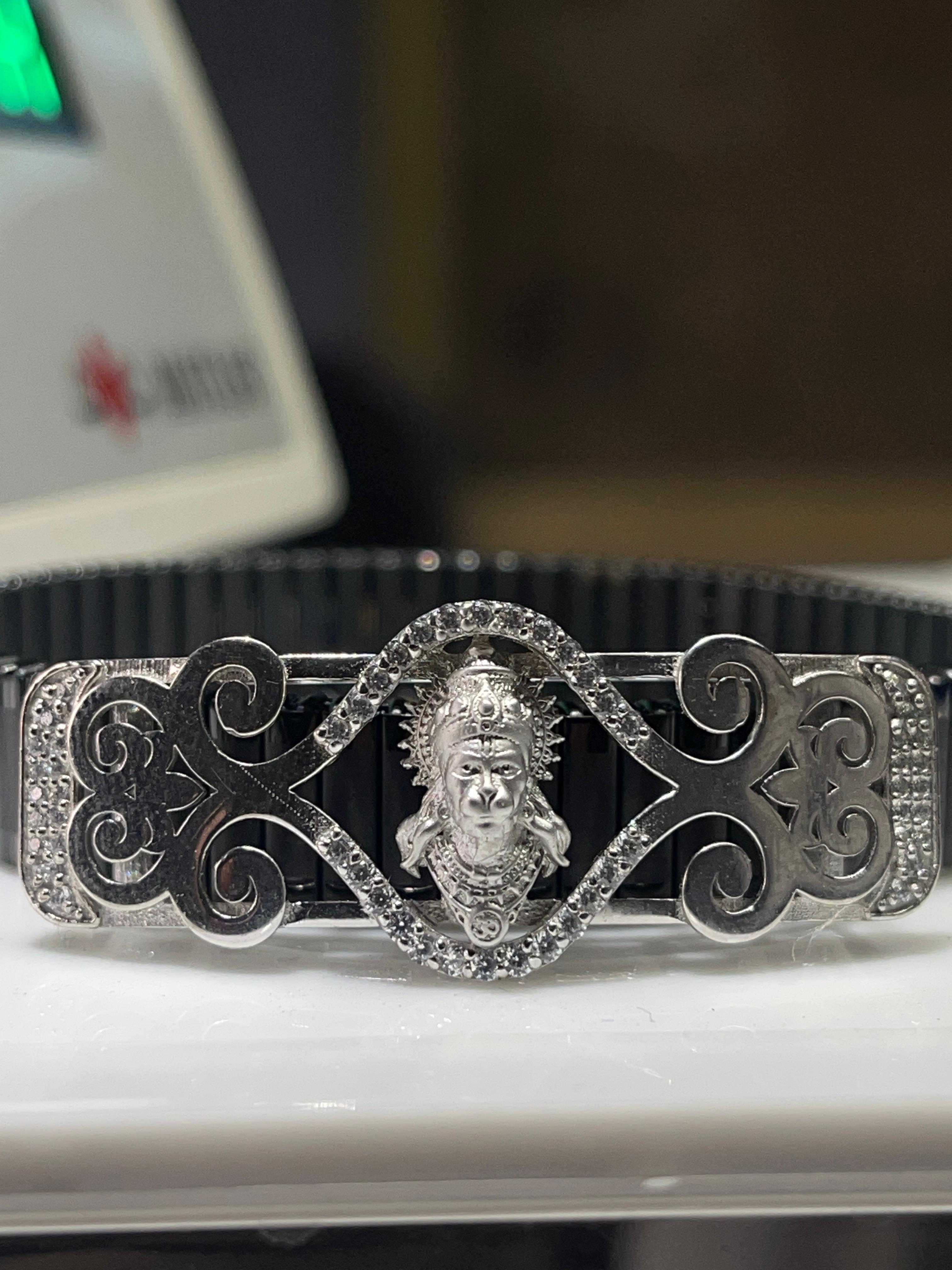 An angled view of the spiritual 925 silver Hanumanji bracelet, showcasing its polished finish and secure clasp.