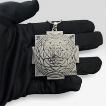Spiritual 925 Silver Shri Yantra Pendant worn to attract positive energy and universal harmony.
