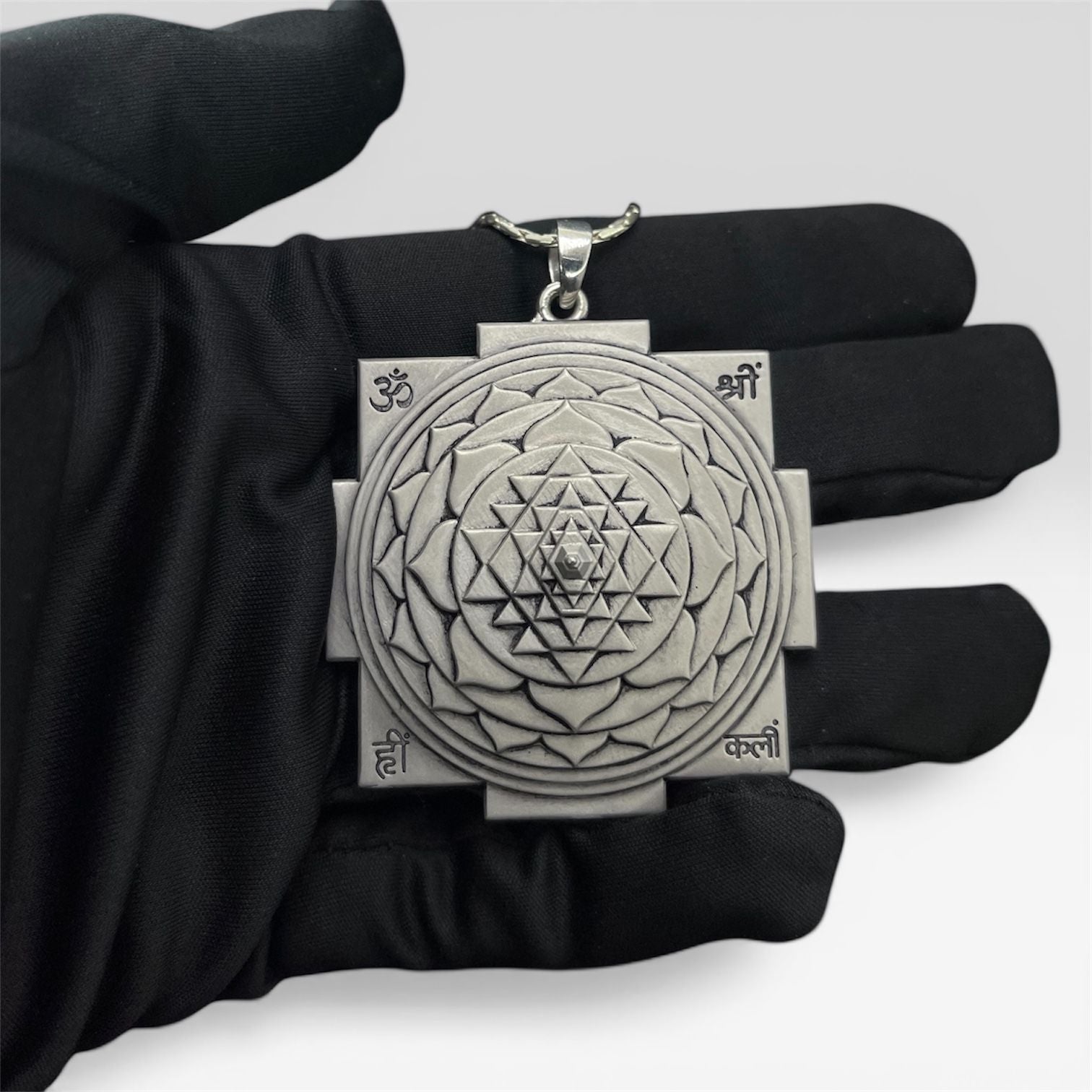 Spiritual 925 Silver Shri Yantra Pendant worn to attract positive energy and universal harmony.