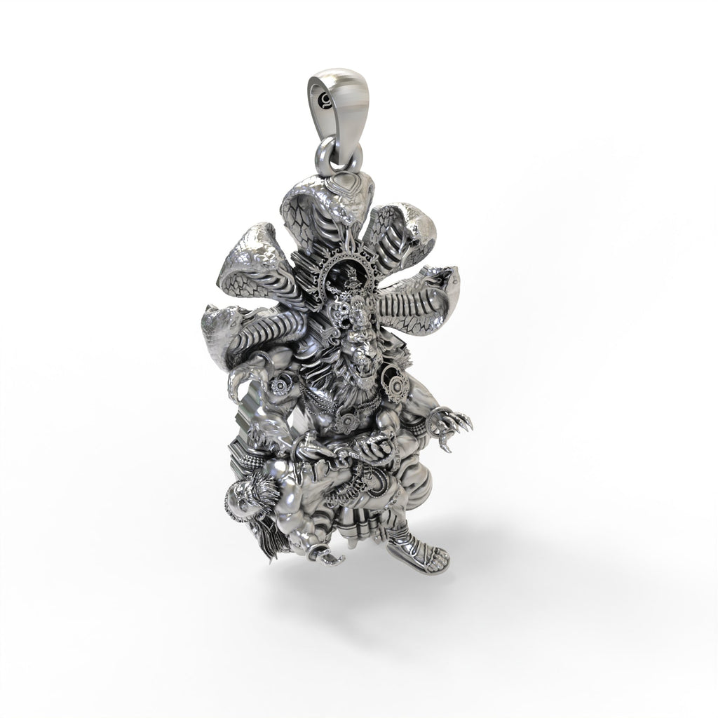 Close-up detail of the antique oxidized texture on the sterling silver Narasimha protection pendant.