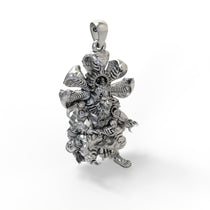 Close-up detail of the antique oxidized texture on the sterling silver Narasimha protection pendant.