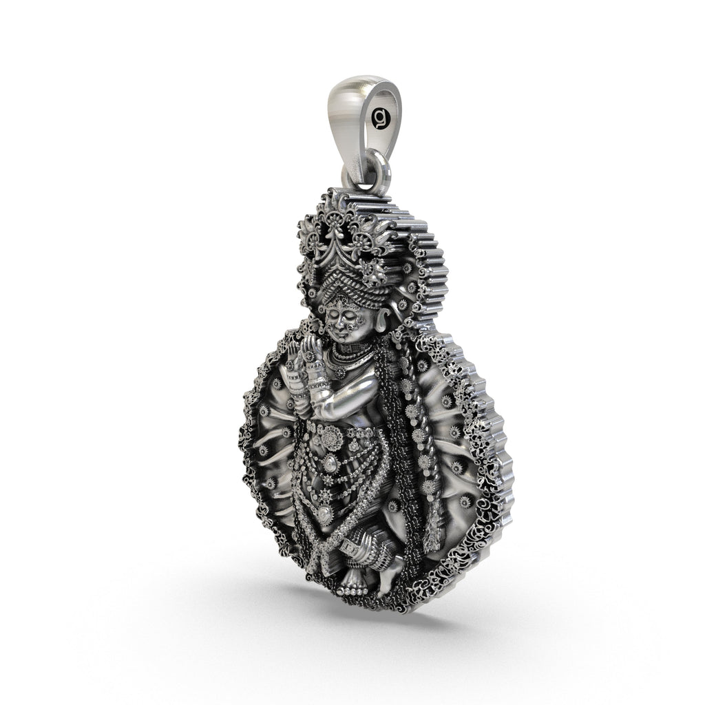 Close-up of the pure sterling silver Radha Vallabha pendant highlighting its sacred craftsmanship.