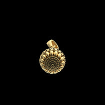 A macro shot capturing the lustrous 18K gold vermeil coating on the 925 silver Hanuman Gada mace pendant for strength.