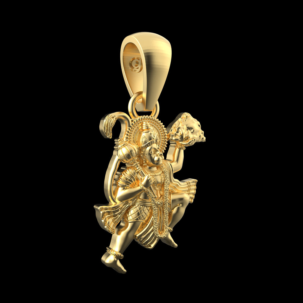 Close-up detail of the handcrafted gold vermeil Hanuman pendant, revealing the fine temple artistry on silver.